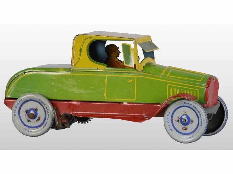 Appraisal: Chein Tin Wind-Up Toy Auto Description Includes original driver Marked