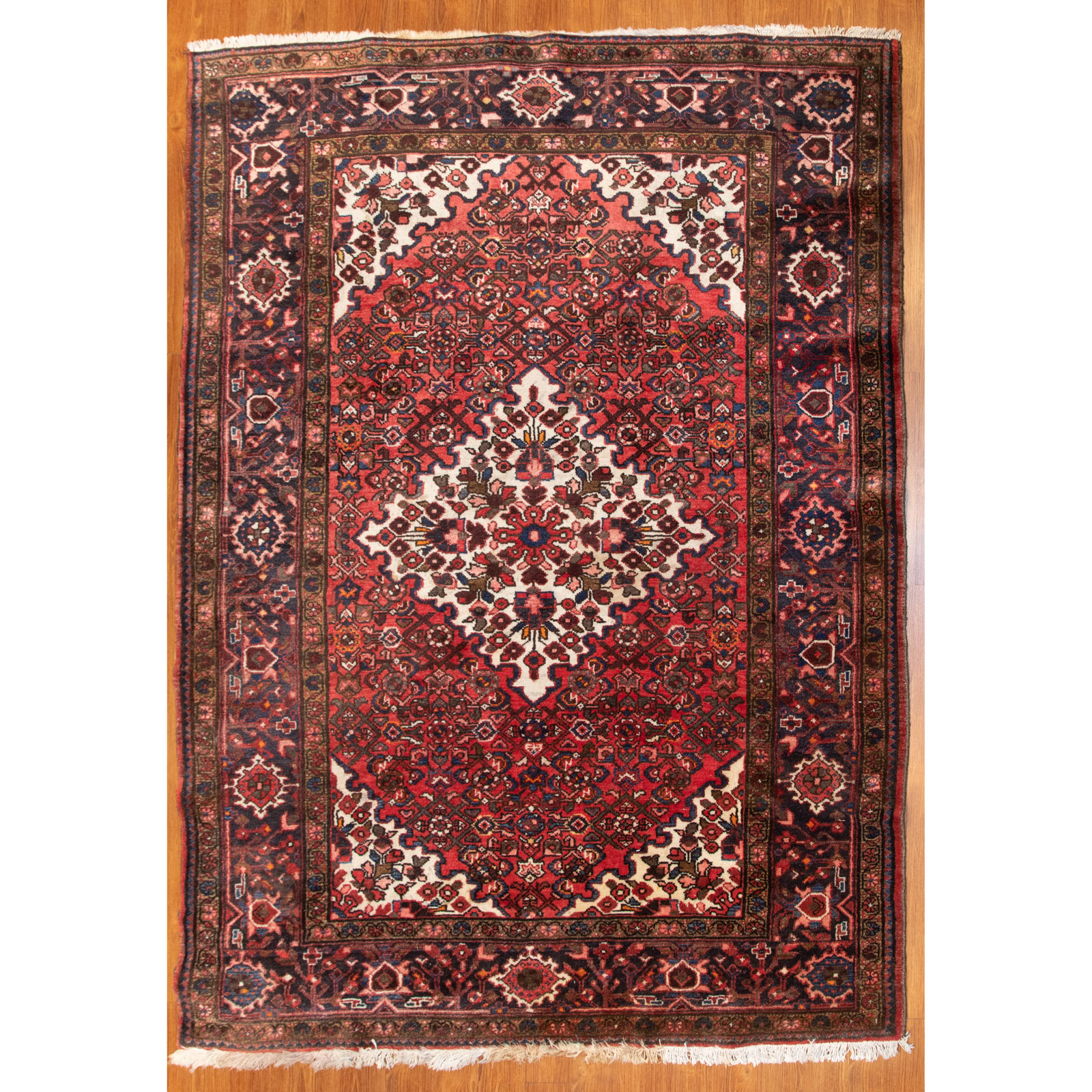 Appraisal: HERIZ RUG PERSIA X Fourth quarter- th century hand-knotted wool