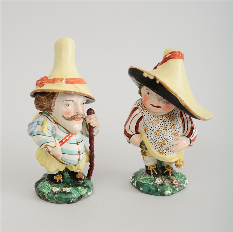 Appraisal: PAIR OF DERBY TYPE PORCELAIN FIGURES OF DWARVES Unmarked each