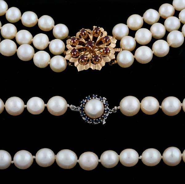 Appraisal: A collection of two cultured pearls gem-set and gold necklaces