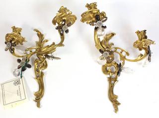 Appraisal: Pair of Louis XV style gilt bronze two light bras