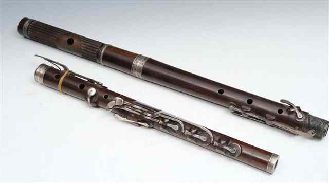 Appraisal: A GEORGE IV ROSEWOOD AND SILVER MOUNTED FLUTE stamped Monzani