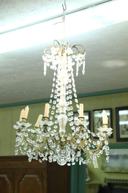 Appraisal: CHANDELIER Brass with molded glass shaft bobeches and cut prisms