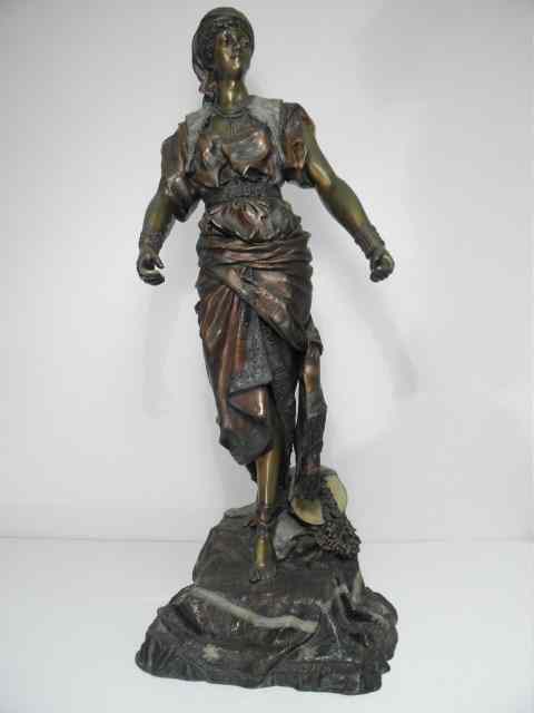 Appraisal: Large bronze sculpture depicting a gypsy woman She has her