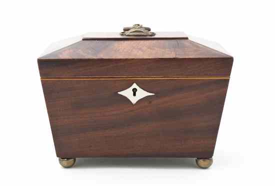 Appraisal: A Mahogany Tea Caddy opening to two lidded wood compartments