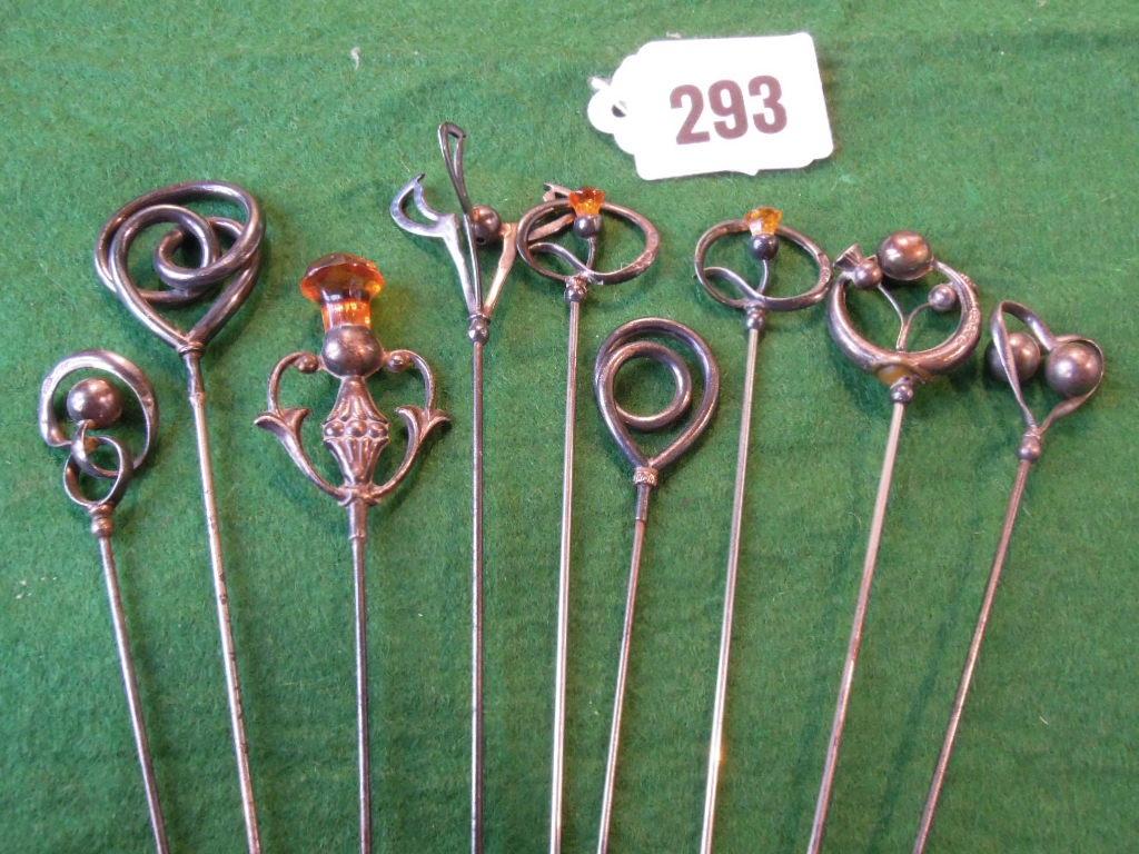 Appraisal: Art Nouveau silver topped hat pins