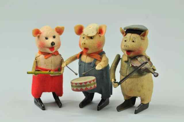 Appraisal: THREE PIG MUSICIANS Schuco Germany each depicted in felt covered