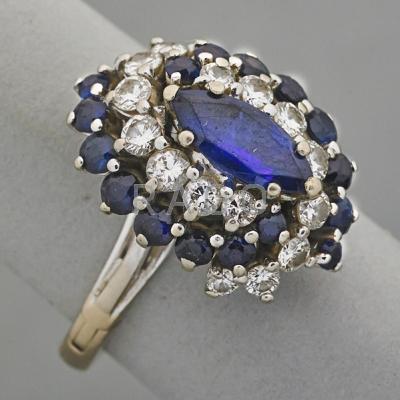 Appraisal: DIAMOND AND SAPPHIRE FINGERLOCK DRESS RING Marquise and circular cut