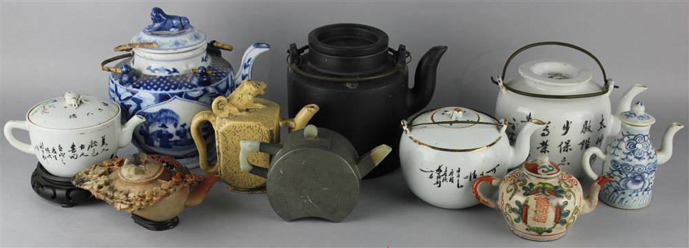 Appraisal: TEN CHINESE TEAPOTS TH C the group including a white