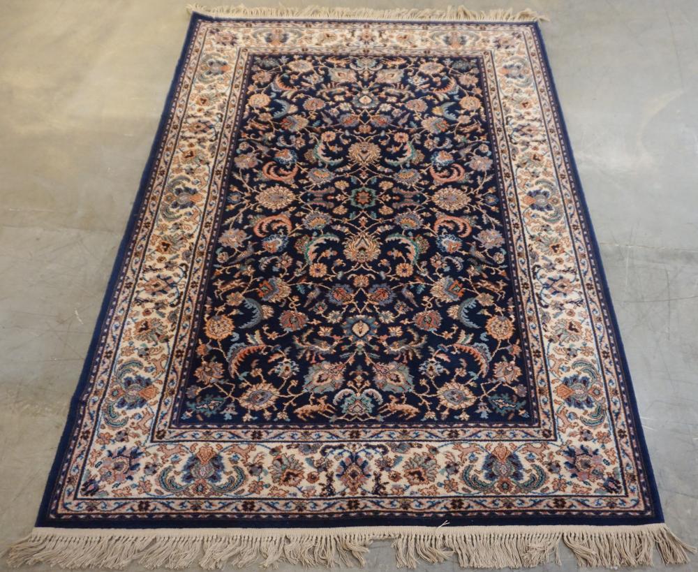 Appraisal: KARASTAN INDIGO TABRIZ MACHINE MADE TABRIZ RUG FT X FT