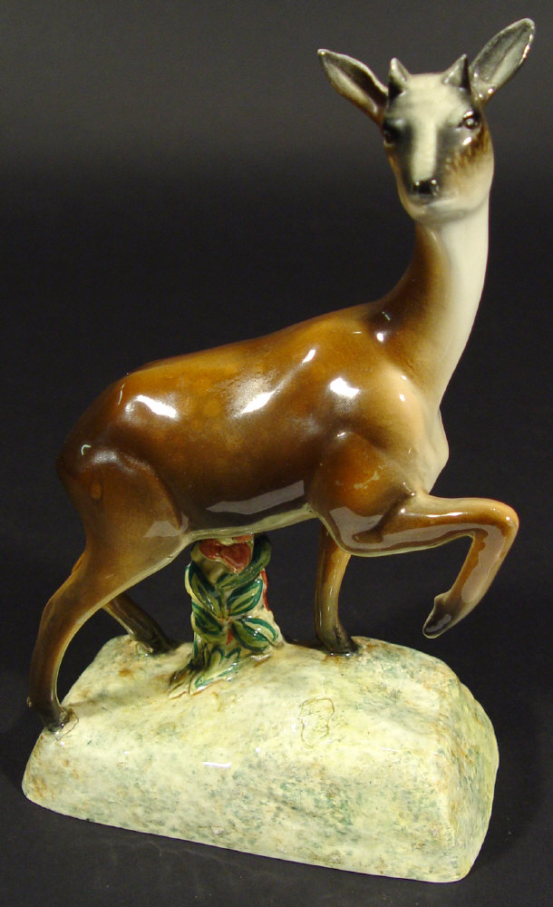 Appraisal: Goldschneider china faun with hand painted decoration produced in association