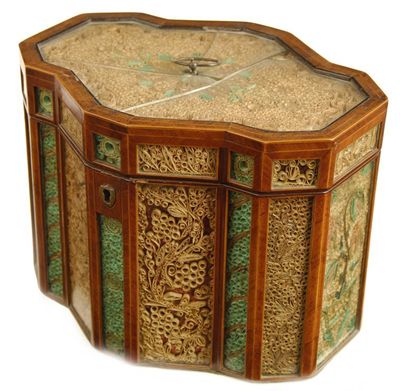 Appraisal: A George III rolled paper hexadecagon tea caddy with kingwood