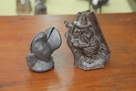 Appraisal: TWO CHOCOLATE MOLDS Pewter turkey ''h Tin witch ''h