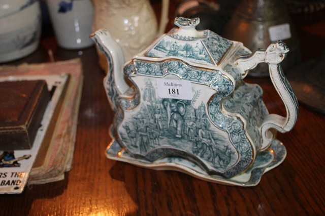 Appraisal: A VICTORIAN INDIAN DECORATED TEAPOT cover and stand decorated with