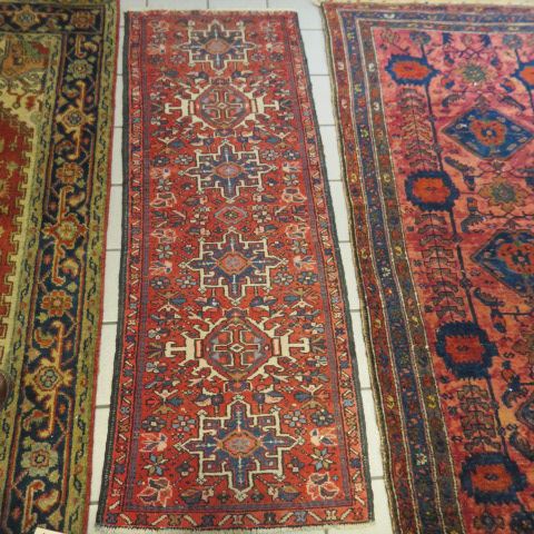 Appraisal: Heriz Persian Handmade Rug fancy designs on red field stylized