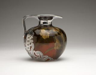 Appraisal: A Rookwood jug with sterling silver overlay Circa marked to