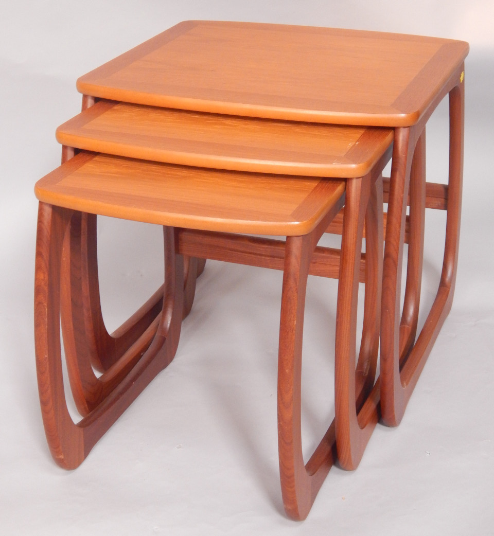 Appraisal: A nest of Parker Knoll teak and crossbanded occasional tables