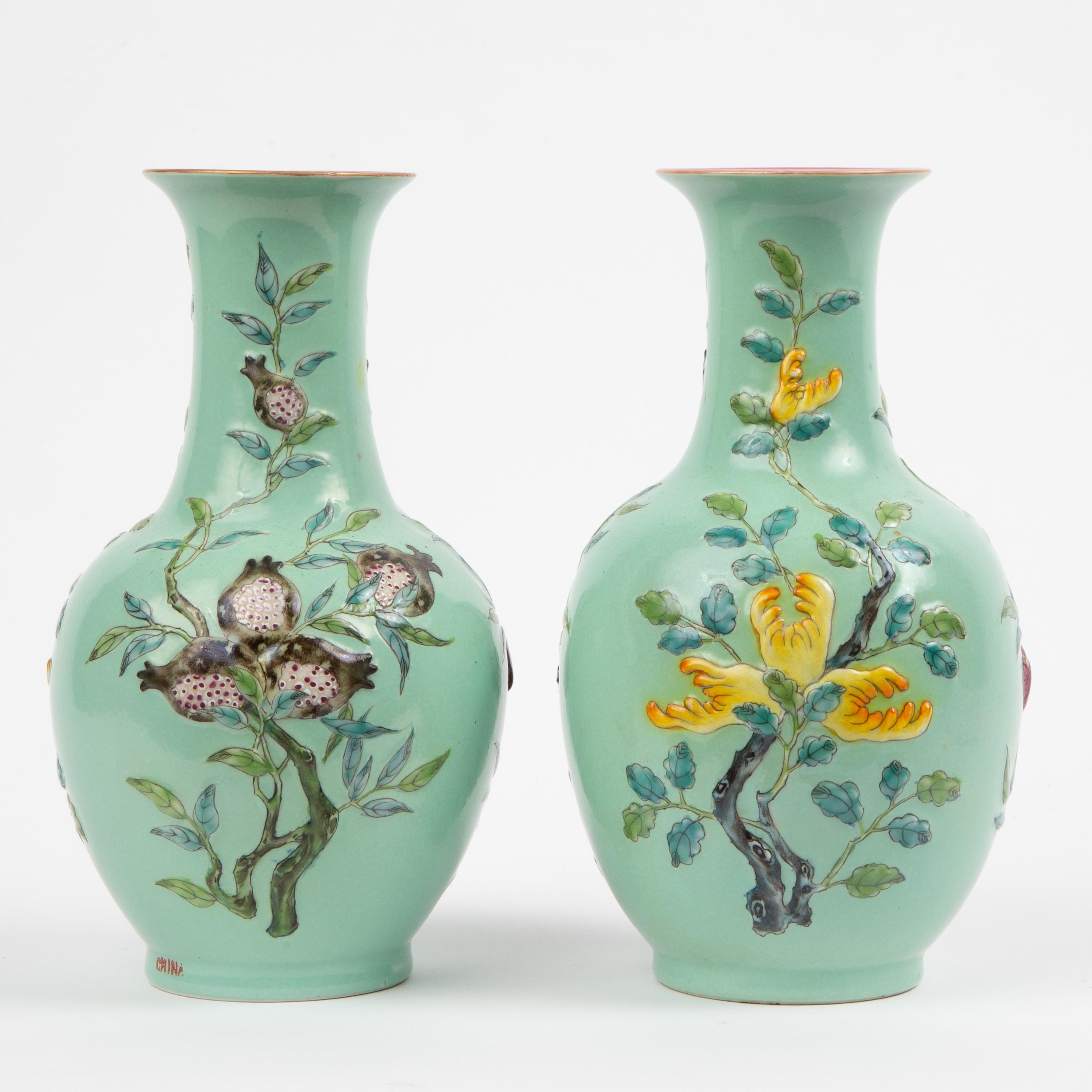 Appraisal: PAIR OF TH C CHINESE HAND-PAINTED BOTTLE VASES A matching