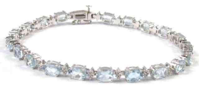 Appraisal: AQUAMARINE DIAMOND AND TEN KARAT GOLD BRACELET - '' in