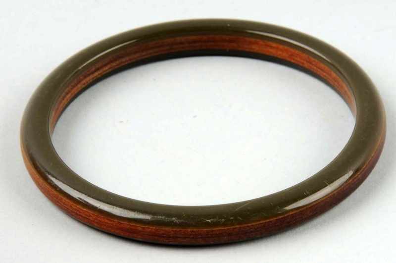 Appraisal: Bakelite Green Bracelet with Wooden Strip Description Unusual piece Condition