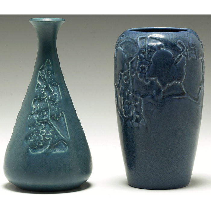 Appraisal: Rookwood vase paneled floral designs under a blue matt glaze