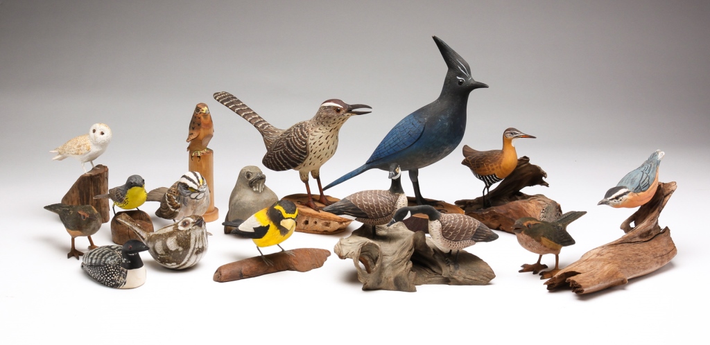 Appraisal: Second half th century Carved wood birds with original paint