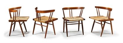 Appraisal: Four grass-seated walnut chairs george nakashima - With hand-turned spindles