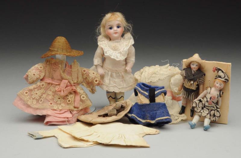 Appraisal: Lot Of All-Bisque Dolls Sweet Kestner girl with swivel neck