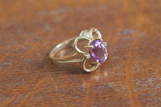 Appraisal: LADIES RING Cut Amethyst center stone flanked by two small