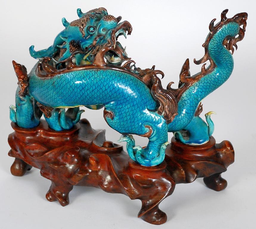 Appraisal: CHINESE PORCELAIN MODEL OF A FOUR TOED SNARLING DRAGON glazed