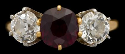 Appraisal: Yellow gold ruby and diamond ring st half of the