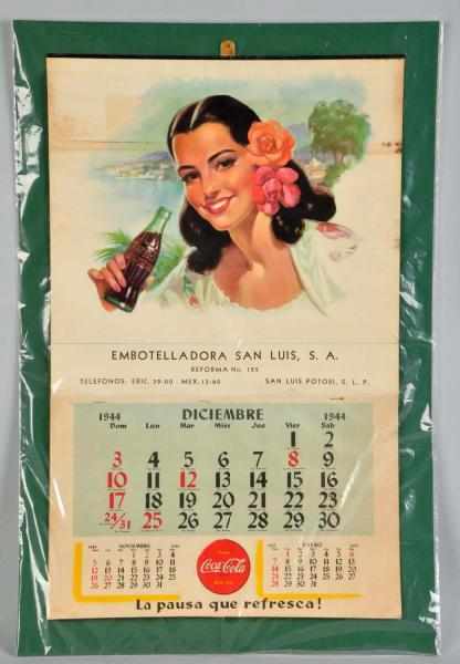 Appraisal: Coca-Cola Spanish Calendar Complete with metal strip and full pad