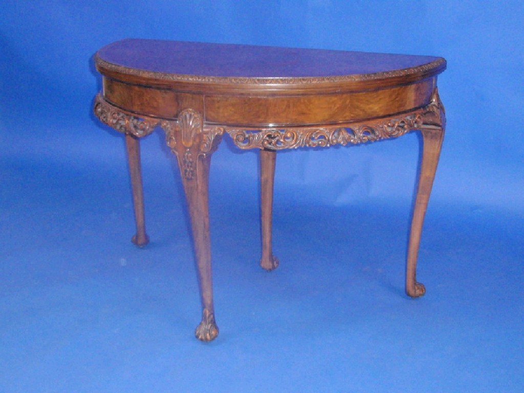 Appraisal: A 's burr walnut demi-lune card table with fold over