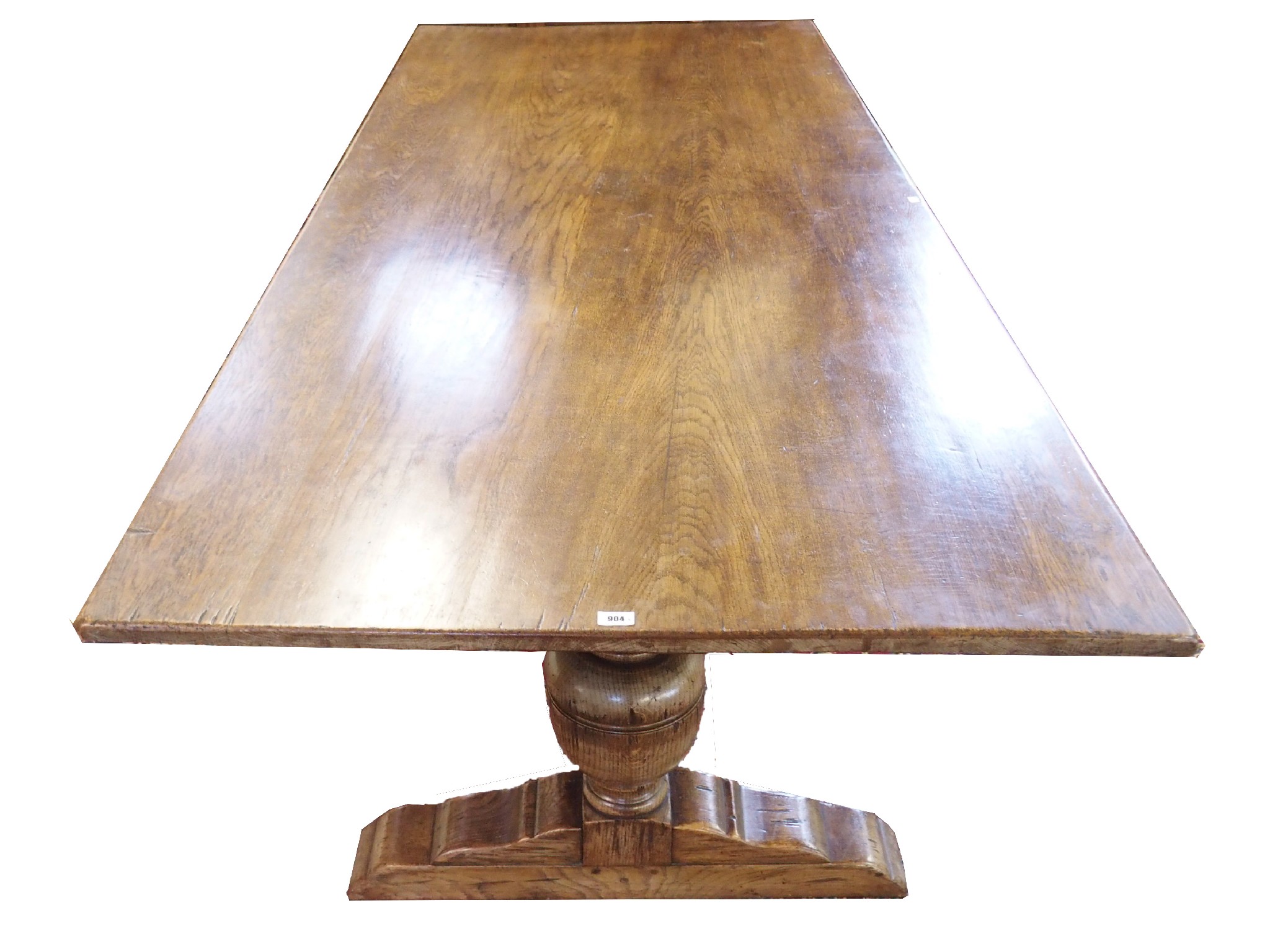 Appraisal: An oak refectory tablethe rectangular top on heavy baluster and