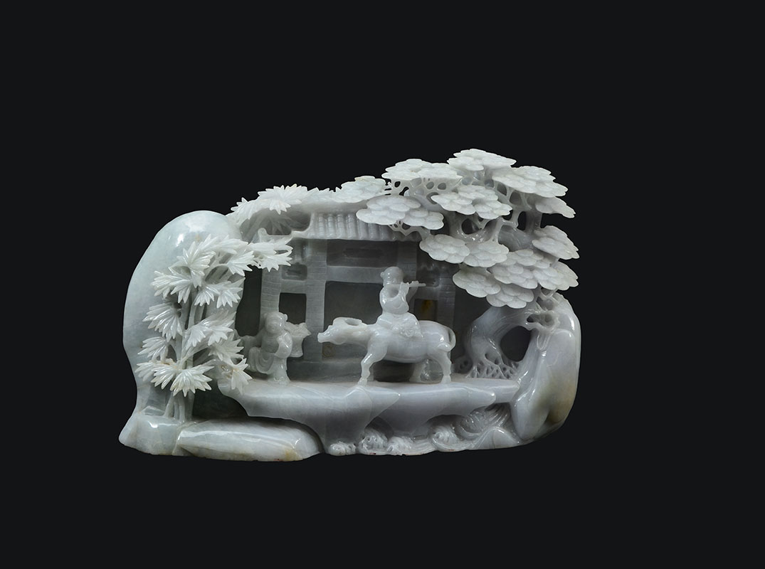 Appraisal: CHINESE CARVED JADEITE BOY RIDING OX FIGURAL GROUP Carved lavender