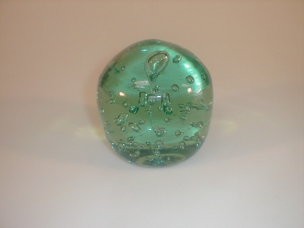 Appraisal: A thC large green glass dump with bubble inclusions high