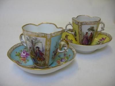 Appraisal: A MATCHED PAIR OF DRESDEN PORCELAIN TWO HANDLED CABINET CUPS