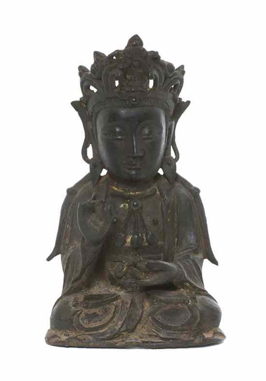 Appraisal: A Chinese Bronze Figure of Guanyin Ming Dynasty the bodhisattva