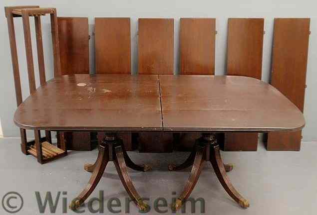 Appraisal: Mahogany two-part dining room table with a pedestal base and