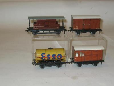 Appraisal: Four Hornby Dublo goods trucks comprising Buff Esso tank wagon