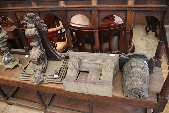 Appraisal: A CARVED OAK BRACKET WITH TERM SUPPORT and scroll decoration