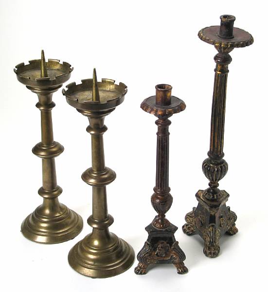 Appraisal: A pair of Continental Baroque style brass prickets together with