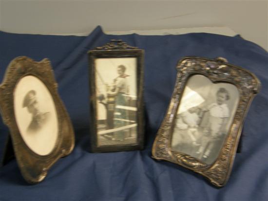 Appraisal: Three silver picture frames