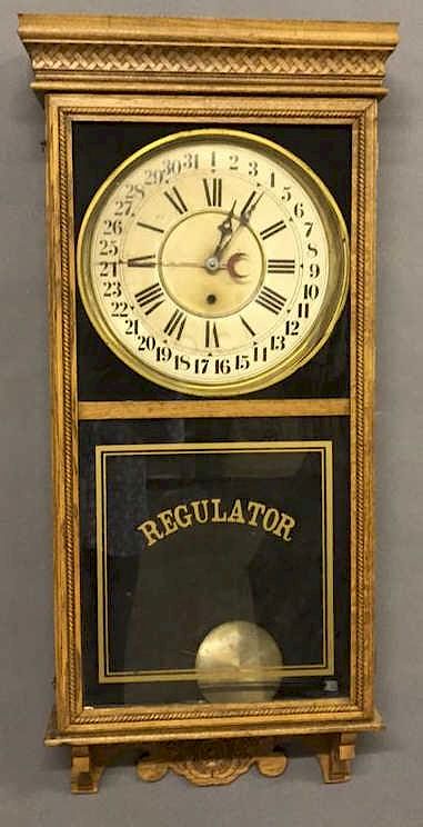 Appraisal: Oak Calendar Regulator Clock Oak calendar regulator clock by Sessions