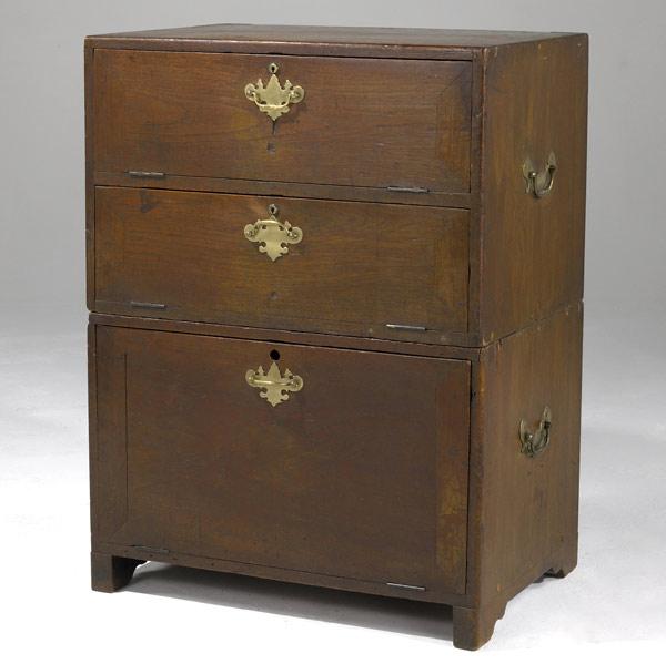 Appraisal: English campaign-style chest th C Two section three drawer chest