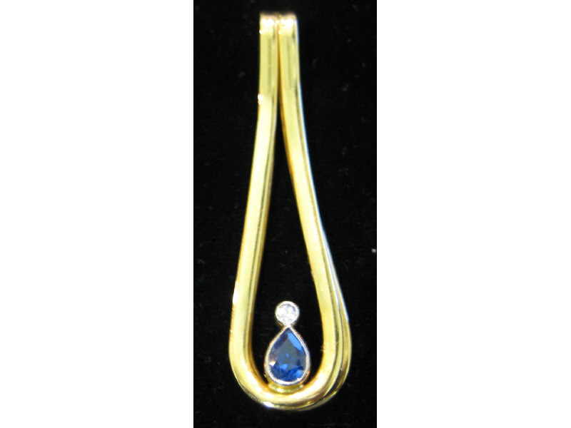 Appraisal: SAPPHIRE AND DIAMOND PENDANT k yellow gold enhancer set with