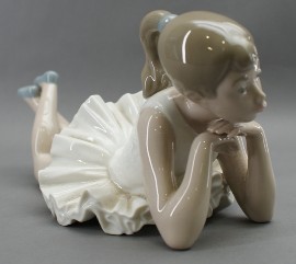 Appraisal: A Nao figure modeled as a resting ballerina cm long