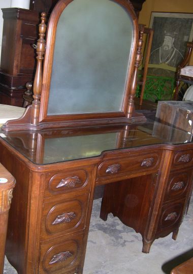 Appraisal: American Rococo Revival-Style Walnut Dressing Table the base with a