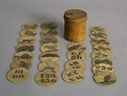 Appraisal: Lithograph animal alphabet game with maple canister th c