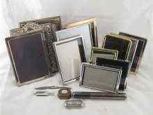 Appraisal: Five modern silver photo frames together with seven plated frames